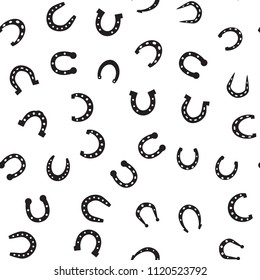 Horseshoe vector seamless pattern. Horse shoe silhouette as international good luck symbol. Endless background with fortune and success signs