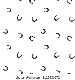 Horseshoe vector seamless pattern. Horse shoe silhouette as international good luck symbol. Endless background with fortune and success signs