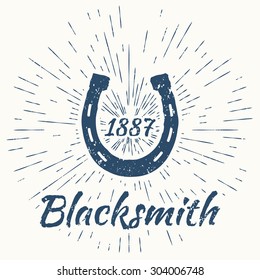 horseshoe and vintage sun burst frame. Blacksmith emblem
