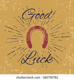 Horseshoe and vintage sun burst with Good Luck text. Blacksmith Label. Vector illustration