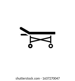 Hospital bed icon vector in black flat design icon, isolated on white background