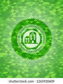 hospital icon inside green emblem. Mosaic background