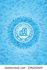 hospital icon inside realistic light blue mosaic emblem