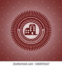 hospital icon inside red emblem