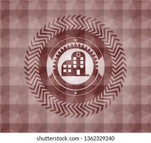 hospital icon inside red seamless geometric badge.