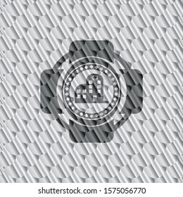 hospital icon inside silver badge. Scales pattern. Vector Illustration. Detailed.