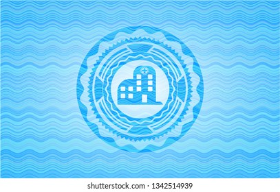 hospital icon inside water concept emblem.