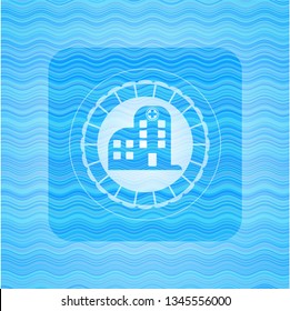 hospital icon inside water wavec oncept emblem.