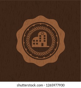 hospital icon inside wood emblem. Vintage.