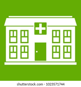 Hospital icon white isolated on green background. Vector illustration