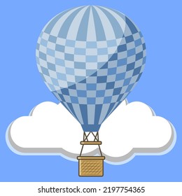 Hot air balloon in blue sky with clouds.