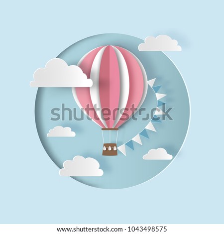 Hot air balloon with bunting flags and clouds. Paper cut out style. Carving art. Vector illustration
