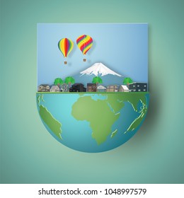 The hot air balloon, cityscape, Fuji mountain in Japan and countryside on blue sky as business, travel, trip in the holiday , paper art and craft style concept. vector illustration.