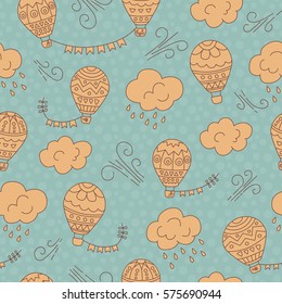 Hot air balloon and clouds. Seamless pattern. Vector hand drawn doodle cartoon