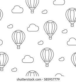 Hot air balloon and clouds. Seamless pattern. Vector hand drawn cartoon.