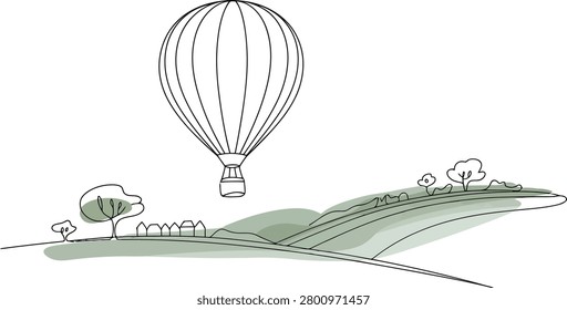 Hot air balloon floats over a green rolling landscape with small houses and trees in a line