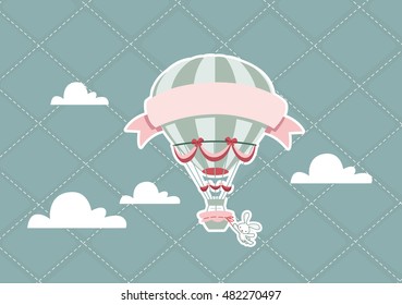 Hot Air Balloon Flying in the Blue Sky with Clouds