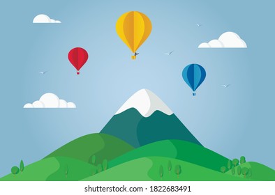Hot air balloon flying in mountains. Paper art and origami style.