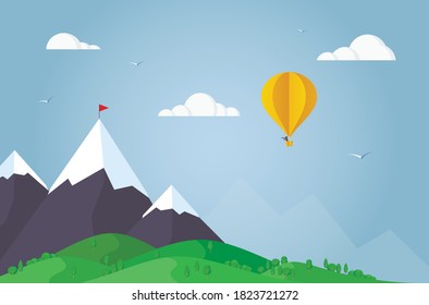 Hot air balloon flying in mountains. Paper art and origami style.