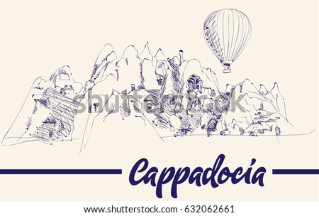 Hot air balloon flying over spectacular Cappadocia