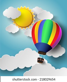 Hot air balloon high in the sky with sunlight. paper art style.