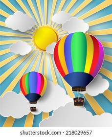 Hot air balloon high in the sky with sunlight .paper art style.