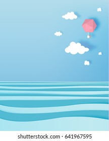 Hot air balloon paper art style with pastel sky and ocean background vector illustration