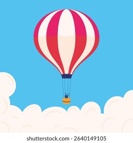 Hot air balloon red and white stripes in the blue cloudy sky 