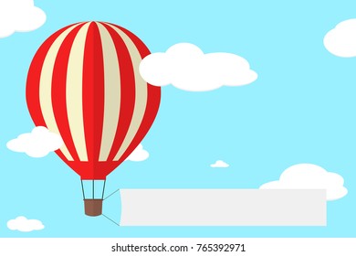 Hot air balloon with ribbon in the sky with clouds. Vector illustration