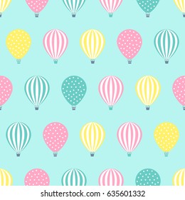 Hot air balloon seamless pattern. Baby shower vector illustration on mint green background. Pastel hot air balloons design for print on baby's clothes, textile, wallpaper, fabric.