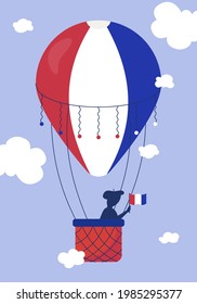 A hot air balloon with a silhouette of a man in a basket holding the national flag of France in his hand. Concept illustration for Bastille Day greeting card. Vector illustration