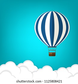 Hot air balloon in the sky with clouds. Flat cartoon design. Vector illustration