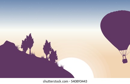 Hot air balloon in the sky of silhouette