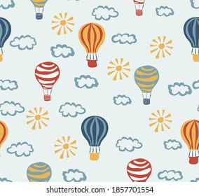 
Hot air balloons aerostats in the sky among the clouds. Vector seamless pattern for the design of children's products. Background for boys and girls. Hand drawn charlier