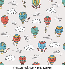 Hot air balloons and clouds. Color hand drawn seamless pattern. Vector illustration in doodle style