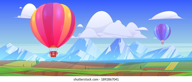 Hot air balloons fly above mountain landscape with green meadows and fields in valley. Vector cartoon illustration with flying colorful airships with baskets in sky, snow peaks and grassland