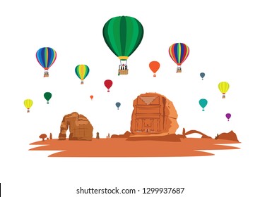 Hot Air Balloons Fly Over the Rock formations, Qasir Al Farid in Madain Saleh and Elephant Rock located in the desert of Saudi Arabia's Al Ula county