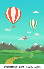 Hot air balloons flying over green meadows with dirt road and trees, snowy mountains with bright blue sky and clouds in the background. Summer landscape cartoon illustration, vector banner. 