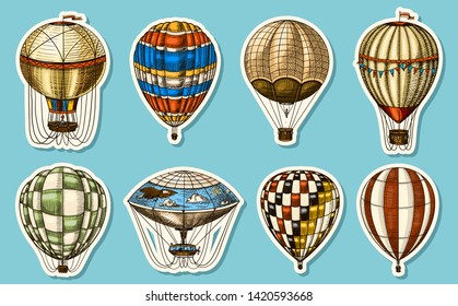 Hot Air Balloons on a blue background. Vector retro flying airships with decorative elements. Template transport for Romantic logo. Hand drawn Engraved vintage sketch.