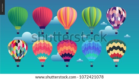 Hot air balloons - set of various colored balloons in the sky with clouds