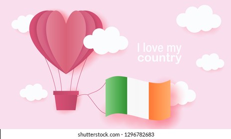 Hot air balloons in shape of heart flying in clouds with national flag of Ireland. Paper art and cut, origami style with love to Ireland