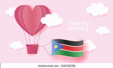 Hot air balloons in shape of heart flying in clouds with national flag of South Sudan. Paper art and cut, origami style with love to South Sudan