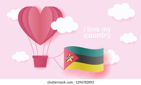 Hot air balloons in shape of heart flying in clouds with national flag of Mozambique. Paper art and cut, origami style with love to Mozambique