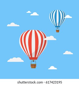 Hot air balloons in the sky vector illustration. Colorful, striped balloons on a blue background. Classic icon air balloons with a basket isolated from the background. 