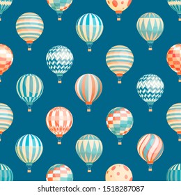 Hot air balloons vector seamless pattern. Flying aircrafts on blue background. Airships with stripes and circles ornaments. Aerostat transport in flight wrapping paper, wallpaper textile design.