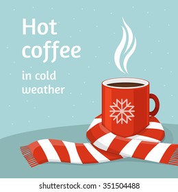 Hot coffee in red cup. Cup of coffee swathed in scarf. Winter background. Christmas card.