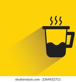 hot coffee with shadow on yellow background