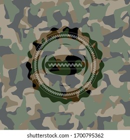 hot dog icon inside camouflaged emblem