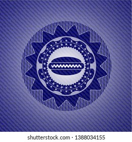 hot dog icon inside denim background
