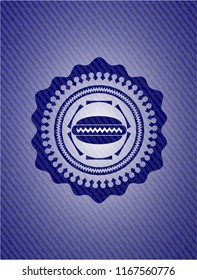 hot dog icon inside emblem with denim high quality background